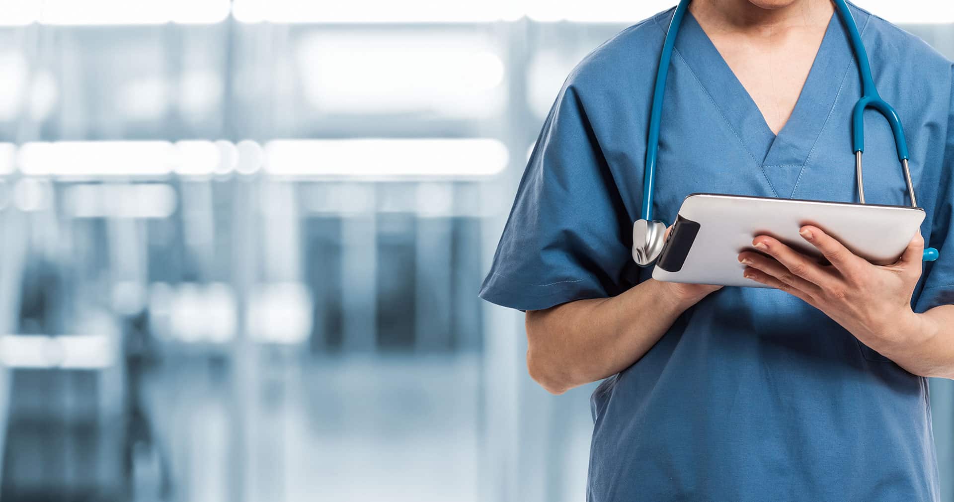 Medical staff scheduling appointments with practice management software.